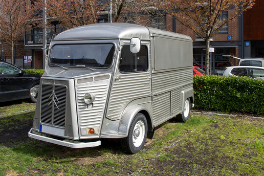 Silver Citroen H Van, 1969 model stands on a roadside, close up photo.