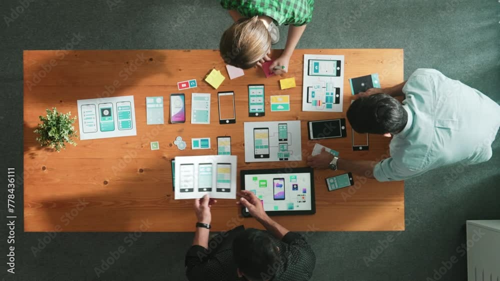 Poster time lapse of software developer working on ux ui design while manager walk at meeting table. team w