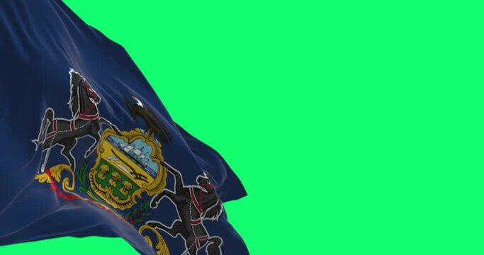 Close-up of Pennsylvania state flag waving isolated on green background