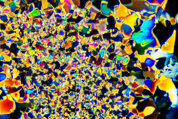 Extreme macro photograph of Tartaric Acid crystals forming vibrant abstract modern art patterns,...
