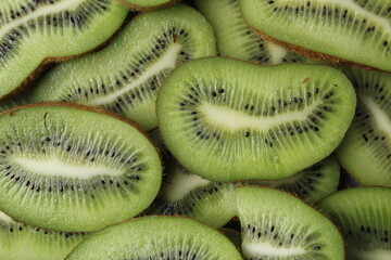 Kiwi is a crappy plan background of food. green food. Vitamin c actinidia seasonal fruits