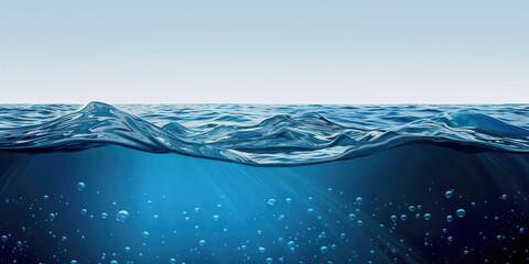 Blue water with air bubbles and clear sky. Cross-section of deep ocean with waves on the surface. Rays of light illuminating clear dark blue water. Marine landscape. Copy space.