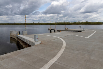 A pier on the river for mooring river ferries for transporting cars and people.