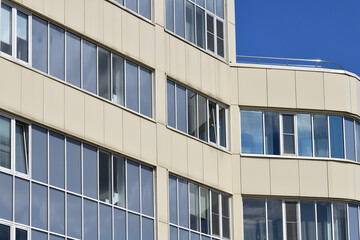 Fragment of an office building with windows