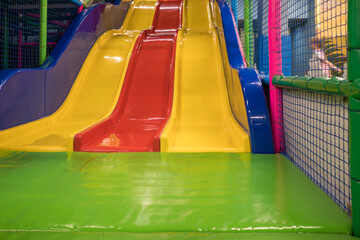 colorful children's slides in the indoor children's park