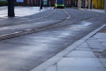 Iron tram tracks and left-turning tracks