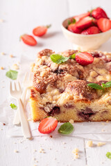 Sweet and delicious strawberry yeast cake freshly baked at home.