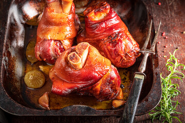 Roasted and homemade Schweinshaxe made with spices. - obrazy, fototapety, plakaty