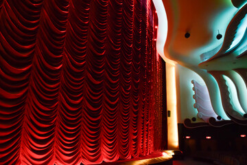 Raj Mandir Theater in Jaipur with illuminated red velvet looms with stalls