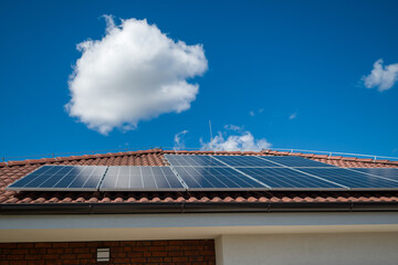 Harvesting Sunshine: Residential Solar Panels Generating Electricity on a Sunny Day