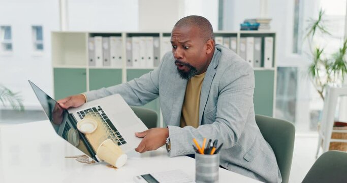 Laptop, business man and coffee spill in office with calculator for accident, mistake or damage. Accountant, keyboard and black employee with hot beverage, mess or technology problem in workplace