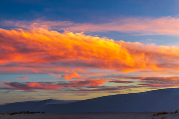 Skys are ablaze during sunset at White Sands National Park. 