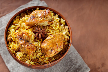 Delicious Indian Dish Chicken Biryani with Basmati Rice in Bowl, Top View, Copy Space