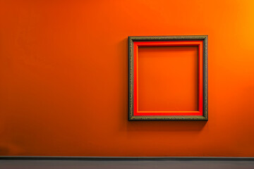 An art gallery with an orange wall, where a single, empty tangerine frame hangs. The frame's...