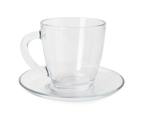 One clean glass cup and saucer isolated on white