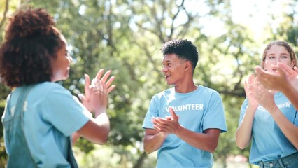 Volunteer, team and community clapping, outdoor and celebration for collaboration, NGO and donation. Cheers, happiness and people with smile for success of fundraising for charity and helping