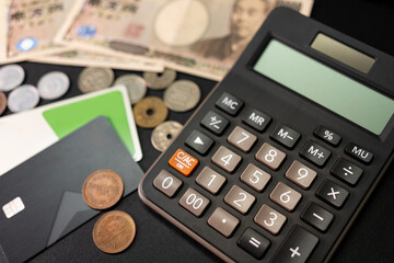 Calculator, Yen Japanese currency and IC card. vacation, planning budget.