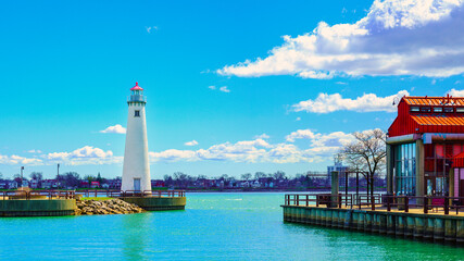 Milliken State Park Lighthouse, the iconic light tower at the harbor marina along the Detroit River in Michigan, USA - obrazy, fototapety, plakaty