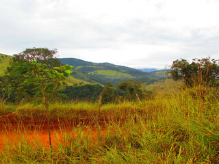 A beautiful landscape of mountains under mountains of a small country town