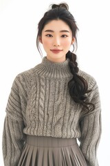 Full face no crop of a Pretty Young Japanese Super Model in a Knit Sweater and Pleated Midi Skirt, showcasing cozy chicness with a warm grin. photo on white isolated background