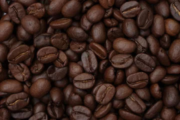 Gartenposter coffee beans background © komthong wongsangiam