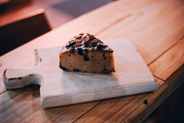 piece of cake with chocolate chips on top
