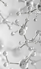 Closeup of a molecular structure on white background, close to a water droplet