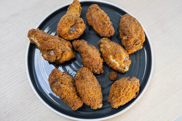 Delicious plate of fried chicken.