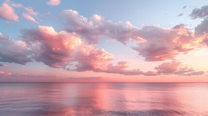 Cirrus clouds tinted pink by the sun at sunset over a calm blue ocean - obrazy, fototapety, plakaty