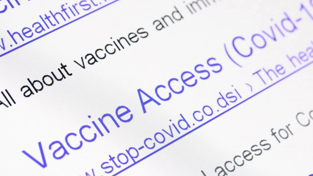 Internet search results for coronavirus with The links of imaginary no-existing websites move on a display, close up.