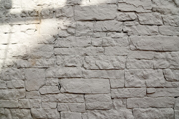 Closeup of Grey Brick Concrete wall is a block texture background for design and decoration at...