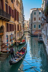 Venice gondola street scene, Venice, Italyi