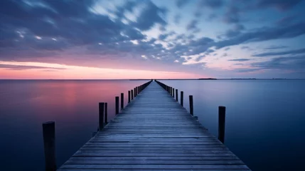 Zelfklevend Fotobehang Dock and pier at sea in twilight long exposure © MOUISITON