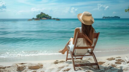 Summer travel beach vacation concept, Traveler asian woman with hat and dress relax on chair beach at Pattaya, Chon Buri, Thailand