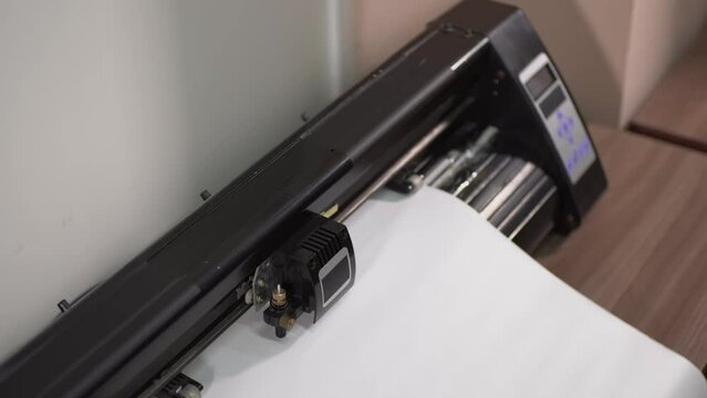 plotter cutting. top view of an electronic device. High-quality shooting in 4K format.