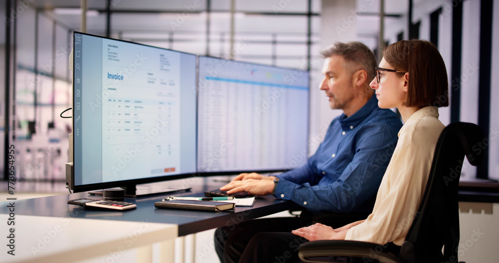 Aufkleber analyst working with spreadsheet business data