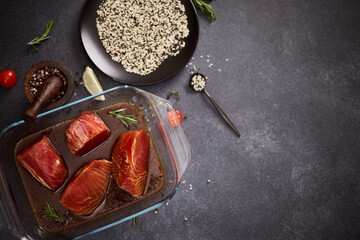 pieces of tuna fillet in a soy sauce marinade and sesame seeds