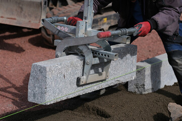 Strassenbau, Einbau von Randsteinen