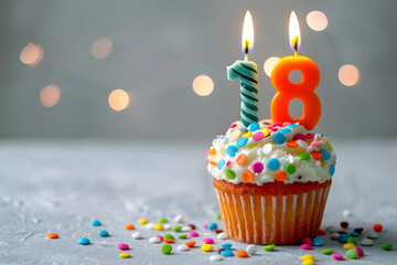 Birthday cupcake with number eighteen candle