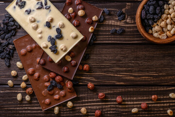 Obraz na płótnie Canvas Chocolate bar pieces. Background with chocolate. Sweet food photo concept.