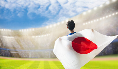 Japan football team supporter on stadium. - obrazy, fototapety, plakaty