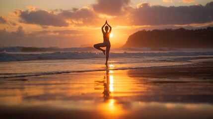 girl doing yoga on the ocean at sunset. female figure silhouette against the background of the sunny golden color of the setting sun stands on the waves on the beach in a pose