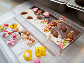 Ingredients for making handmade chocolates and candies in a workshop