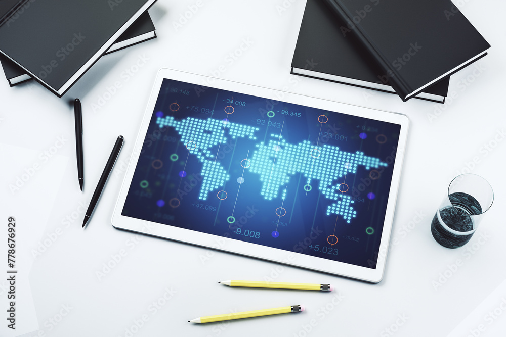 Poster abstract creative world map on modern digital tablet monitor, tourism and traveling concept. top vie