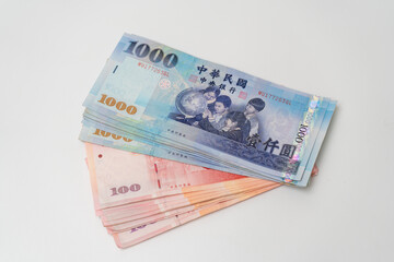 Taiwanese dollar banknote on white background - 778693520
