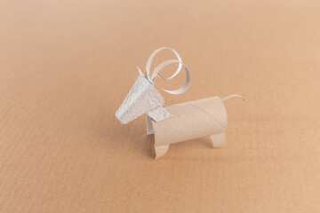 Engage kids with an interactive DIY project using egg boxes and cardboard to create farmyard animal figures. creativity and sustainability while crafting cattle or goat models. fun and education