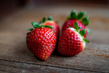 Strawberries On A Wooden Table