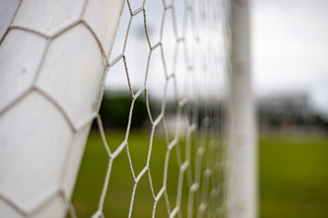 Close Up Of Football Net In Stadium.