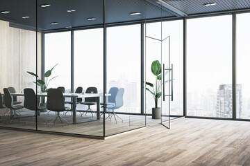 Modern glass conference room interior with wooden flooring, furniture and panoramic window with...