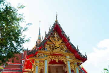 The majestic Wat Chalong Buddhist temple in Phuket, Thailand. This temple was built in the 19th century, apart from being a house of worship, it is also a popular tourist destination in Phuket.